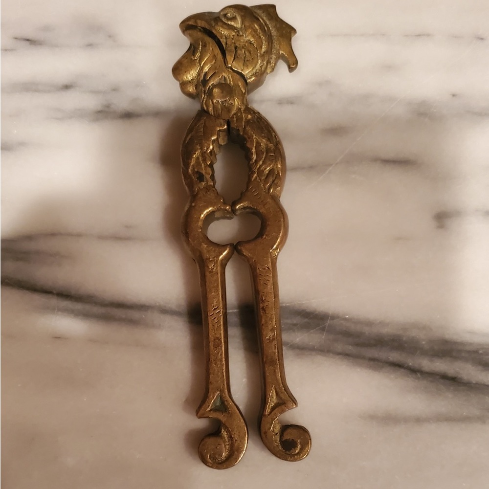Vintage brass rooster nut cracker